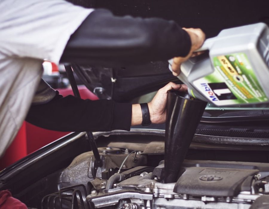 Fresh oil being poured into an engine